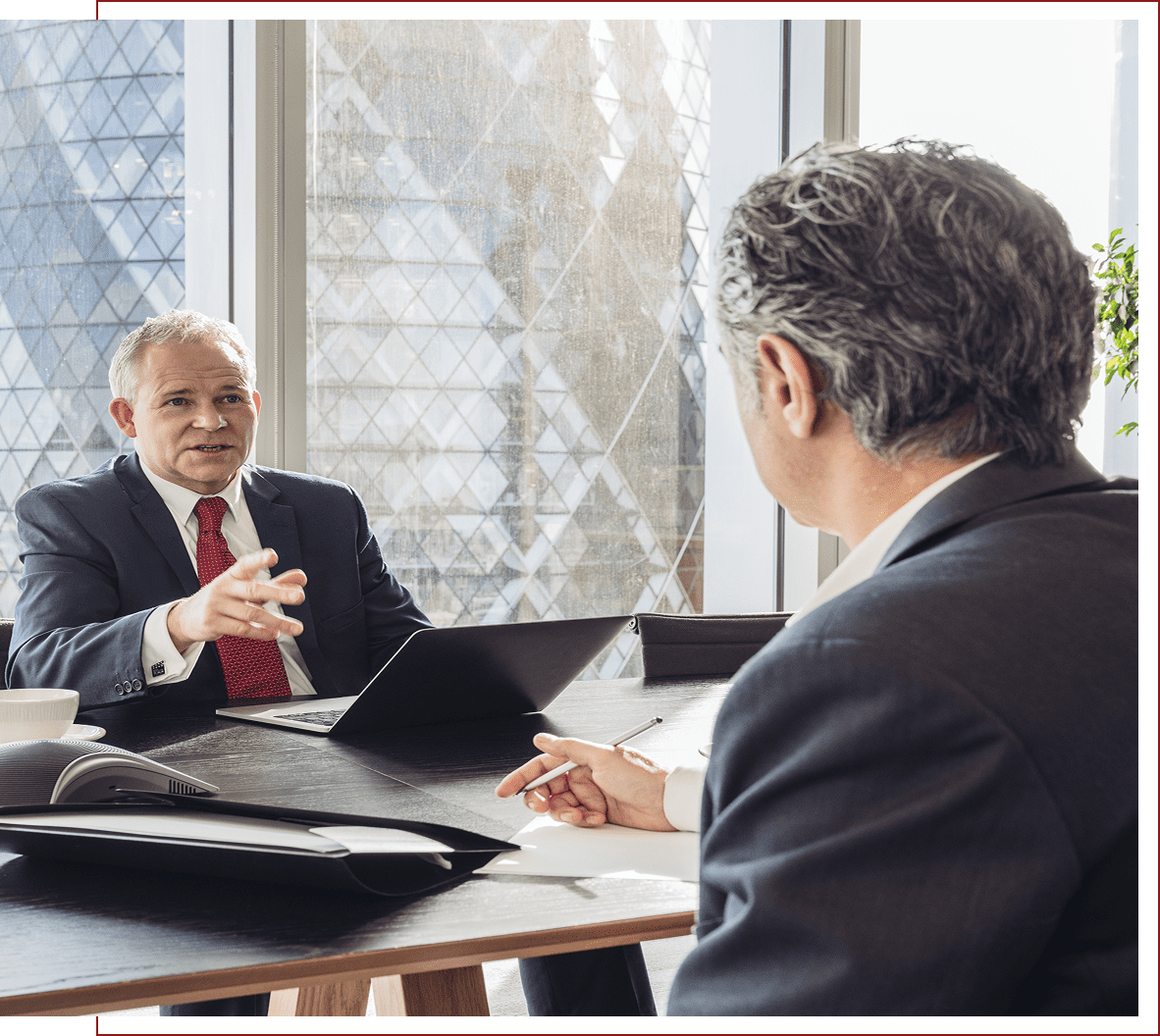 Business meeting with laptops