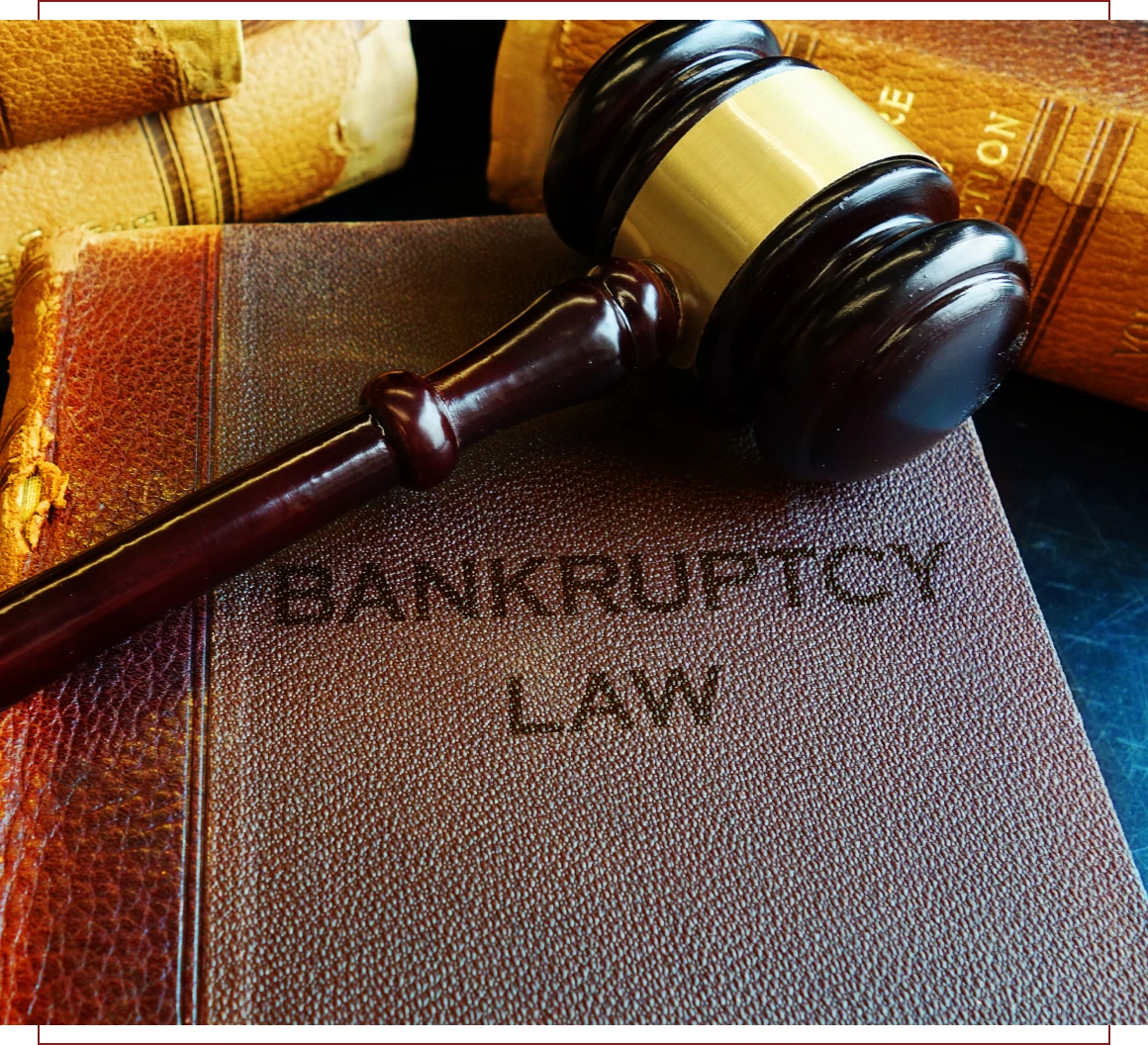 Gavel resting on bankruptcy law book